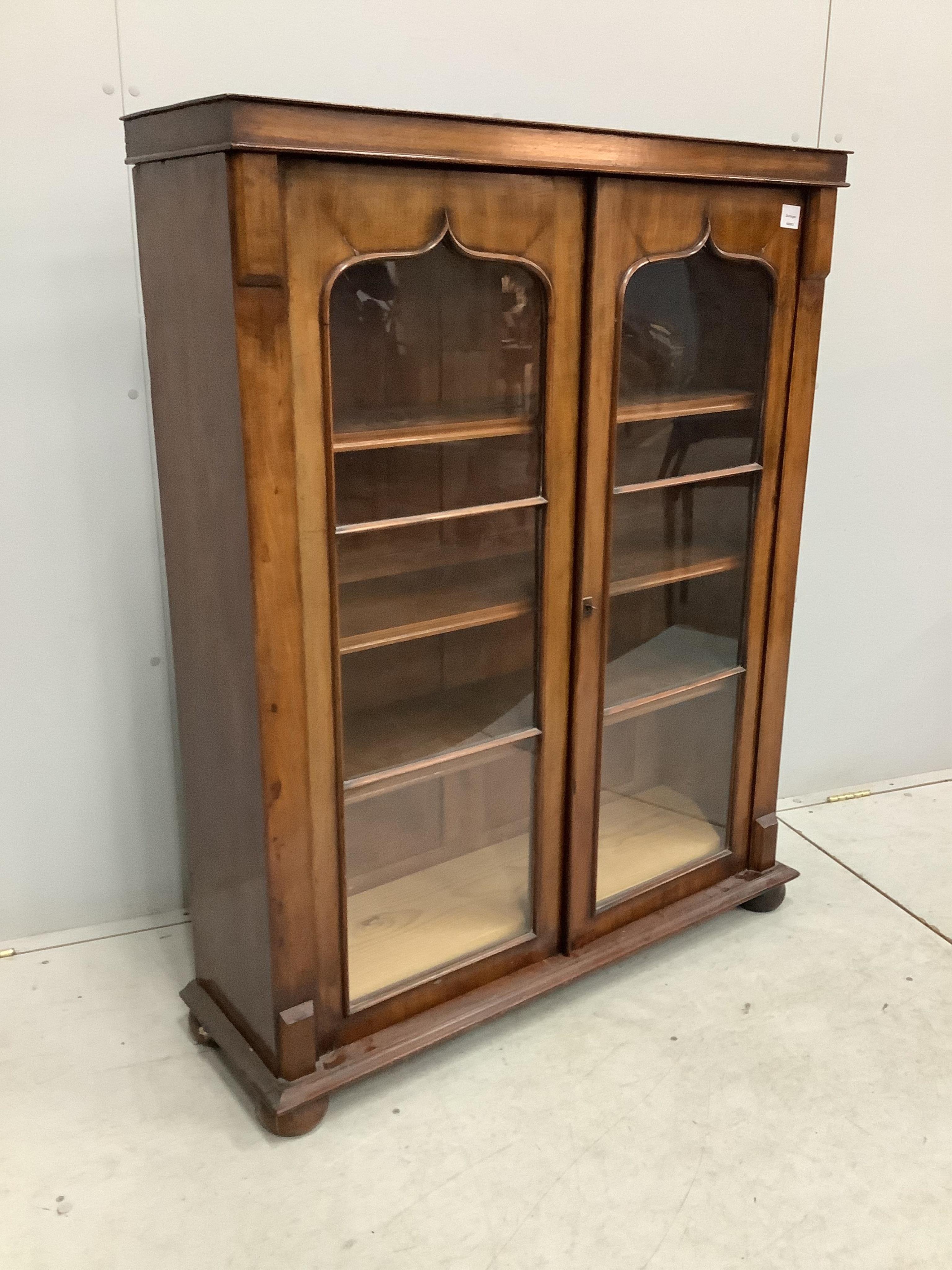 An early Victorian mahogany bookcase, (adapted), width 100cm, depth 30cm, height 127cm. Condition - fair